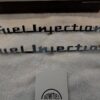 1957 Chevy Bel Air Fuel Injection Emblems – NOS in Box