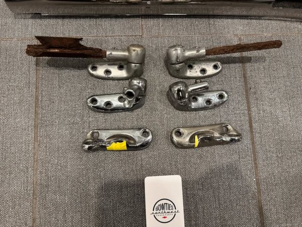 1958 Chevy Impala Convertible Inner Windshield Trim + Visor Brackets and Top Striker Plate