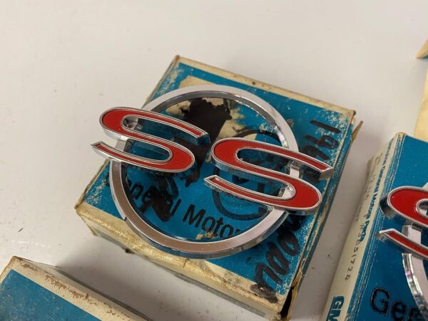 1964 Chevy Impala SS Emblems – NOS (New Old Stock) – In Original Box