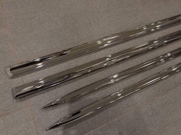 1955 Chevy 2-Door Nomad Side Moldings – OEM Restored (4-Piece Set)