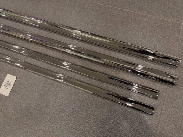 1955 Chevy 2-Door Nomad Side Moldings – OEM Restored (4-Piece Set)