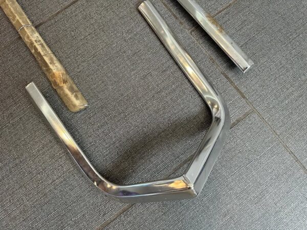 bowties_northwest-r%e2%a4%93download-7-31 1963 Chevy Impala Rear Trunk & Cove Moldings OEM NOS – Original GM Chrome Trim