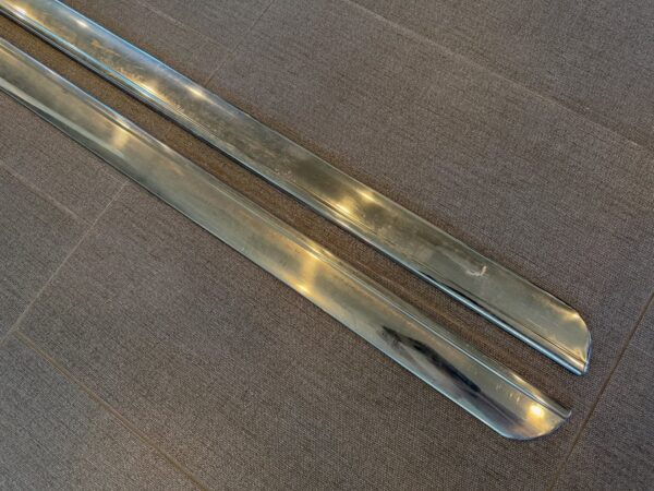 bowties_northwest-r%e2%a4%93download-7-42 1957 Chevy Bel Air Rocker Moldings – NOS Original